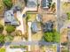 Aerial view of the property showcasing its location, landscaping, and proximity to surrounding neighborhood at 27 Dove Sw Ave, Concord, NC 28025