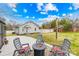 Cozy backyard patio with stylish seating area and modern fire pit, perfect for relaxing at 27 Dove Sw Ave, Concord, NC 28025