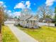 Attractive home with a well-manicured lawn, showcasing its inviting curb appeal at 27 Dove Sw Ave, Concord, NC 28025