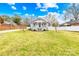 Charming home with a well-manicured front yard, classic architecture, and inviting front porch at 27 Dove Sw Ave, Concord, NC 28025