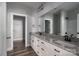 Bathroom featuring double sink granite countertop, and walk-in closet at 2832 12Th Sw Ave, Hickory, NC 28602