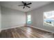 This bedroom features wood-look floors and two bright windows at 2832 12Th Sw Ave, Hickory, NC 28602