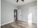 Bedroom features wood-look floors and an adjoining door at 2832 12Th Sw Ave, Hickory, NC 28602