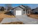 Low angle view of a single Gathering home featuring a one car garage and concrete driveway at 2832 12Th Sw Ave, Hickory, NC 28602