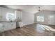 Bright kitchen with stainless steel appliances, white cabinets and dark hardware at 2832 12Th Sw Ave, Hickory, NC 28602