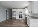 Kitchen featuring shaker style cabinets, stainless steel appliances, and granite countertops at 2832 12Th Sw Ave, Hickory, NC 28602