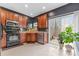 Well-lit kitchen with stainless steel appliances and sliding door at 3028 Summerfield Ridge Ln, Matthews, NC 28105