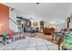 Spacious living room with hardwood floors, multiple seating areas, and stylish accents at 3028 Summerfield Ridge Ln, Matthews, NC 28105