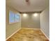 Well-lit bedroom with natural light and neutral paint at 3029 Winding Trl, Matthews, NC 28105