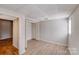 Bright bedroom featuring a closet, with modern laminate flooring and neutral paint at 3029 Winding Trl, Matthews, NC 28105