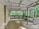 Wooden deck overlooks a wooded backyard at 3029 Winding Trl, Matthews, NC 28105