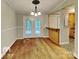 Bright dining area with hardwood floors and access to deck at 3029 Winding Trl, Matthews, NC 28105