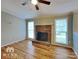 Living room with fireplace and hardwood floors at 3029 Winding Trl, Matthews, NC 28105