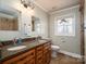 Bathroom with double vanity and granite countertop at 3044 Old Church Rd, Gastonia, NC 28052