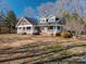 Inviting home with a spacious porch, perfect for relaxing and enjoying the outdoors at 3044 Old Church Rd, Gastonia, NC 28052