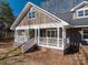 Front porch with white columns and brick steps at 3044 Old Church Rd, Gastonia, NC 28052