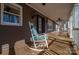 Spacious front porch with rocking chair and ceiling fan at 3044 Old Church Rd, Gastonia, NC 28052