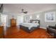 Large main bedroom with hardwood floors and a walk-in closet at 3044 Old Church Rd, Gastonia, NC 28052