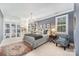 Bedroom with abundant natural light, neutral paint, carpet floors, a chandelier, and ample closet space at 3421 Walston Ln, Charlotte, NC 28211