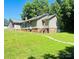 Ranch-style home with brick foundation and steps at 35 Marsh Ave, Wadesboro, NC 28170