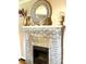 Fireplace with decorative mirror and vases at 35 Marsh Ave, Wadesboro, NC 28170