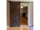 Barn door leading into another room at 35 Marsh Ave, Wadesboro, NC 28170