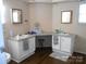 Double vanity bathroom with ample storage and a corner sink at 3935 Tower Rd, Maiden, NC 28650