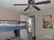 Bunk beds in a bedroom with a view of the kitchen at 3935 Tower Rd, Maiden, NC 28650