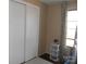 Bedroom with closet and window with curtains at 3935 Tower Rd, Maiden, NC 28650