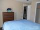 Bedroom with double bed, dresser and access to another room at 3935 Tower Rd, Maiden, NC 28650