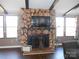 Stone fireplace with built-in shelving at 3935 Tower Rd, Maiden, NC 28650