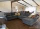 L-shaped sectional sofa anchors this living room at 3935 Tower Rd, Maiden, NC 28650