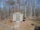 Wooden shed with ramp in wooded backyard at 3935 Tower Rd, Maiden, NC 28650