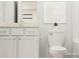 Stylish bathroom with white vanity and toilet at 4076 Skyboat Cir, Fort Mill, SC 29715