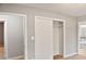 Bedroom with mirrored closet doors and neutral wall paint at 4127 Bon Rea Dr, Charlotte, NC 28226