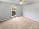 Spacious bedroom with neutral walls and plush carpeting at 4127 Bon Rea Dr, Charlotte, NC 28226