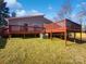 Two-tiered deck overlooking grassy backyard at 4127 Bon Rea Dr, Charlotte, NC 28226