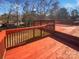 Large deck with wooden railings and a view of the backyard at 4127 Bon Rea Dr, Charlotte, NC 28226