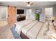 Virtually staged main bedroom with barn door and walk-in closet at 4127 Bon Rea Dr, Charlotte, NC 28226