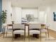 Dining room with wood table and light grey chairs at 4519 Potters Wheel Dr, Fort Mill, SC 29715