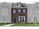 Brick two-story home with gray shutters and a front yard at 4527 Potters Wheel Dr, Fort Mill, SC 29715