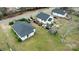 Aerial view of multiple homes with a tree in the front yard at 504 Glasgow Rd, Charlotte, NC 28214