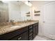 Elegant bathroom with granite countertops and double sinks at 5063 Gribble Ln, Lancaster, SC 29720