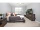 Bright bedroom featuring a king-size bed and ample space at 5063 Gribble Ln, Lancaster, SC 29720