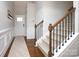 Bright and spacious entryway with hardwood floors and staircase at 5063 Gribble Ln, Lancaster, SC 29720