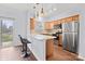 Well-lit kitchen offering a breakfast bar, modern stainless steel appliances, and ample cabinet space at 528 Fawnborough Ct, Rock Hill, SC 29732