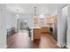 Bright kitchen featuring a breakfast bar, modern lighting, and stainless steel appliances at 528 Fawnborough Ct, Rock Hill, SC 29732