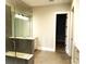 Bathroom with a walk-in shower and double vanity at 553 W Lowrance Ave, Mooresville, NC 28115