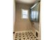 Laundry room with green cabinets and patterned tile floor at 553 W Lowrance Ave, Mooresville, NC 28115