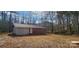 Ranch home with a spacious backyard and wooded area at 704 W Border St, Dallas, NC 28034